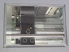 Quantum ATL L200 interior close-up showing robotic picker mechanism, linear guide rails, and drive bay assembly