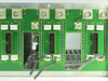 Wegener 1601-54 rear backplane close-up showing card slot connector array with labeled junction points J2 through J32 and BNC-style standoff connectors