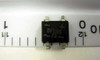 ON Semiconductor DF08S SMD bridge rectifier single unit next to ruler showing approximately 5mm body width