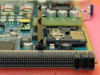 Ericsson CBU1 PCB left-section close-up showing compact flash or memory slot area, capacitors, and small daughter board