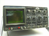 Philips PM3243 storage oscilloscope – front panel close-up showing CRT screen with phosphor trace and knobs