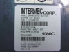 Intermec Corp label on bottom of 9180C01 showing model 9180C01, configuration 9180C, manufactured August 1995, rated 10V 500mA, serial number barcode