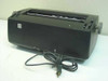 IBM Correcting Selectric II typewriter – rear view showing power cord and platen knob