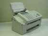 Sharp UX-B700 Plain Paper Inkjet Fax machine — three-quarter front view showing ADF, control panel, handset cradle, and paper trays
