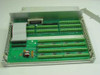 Interior view of Scientific Solutions 943244 Analog Multiplexer showing green PCB with screw-terminal input blocks, ribbon cable, and 50-pin connector assembly