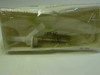 Abbott VENOSET 1832 IV piggyback set through sealed packaging showing tubing and needle assembly, Lot No. 64-324NS and No. 1832 visible