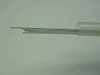 Ethicon DS-25 Ethi-Pack monofilament surgical steel suture strands visible extending from open end of protective tube