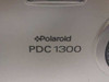 Polaroid PDC-1300 — close-up of brand logo and model name on camera body