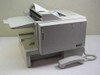 Minolta MinoltaFax 5600 rear-right view showing telephone handset resting beside machine