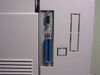 Minolta MinoltaFax 2800 rear panel close-up showing parallel (Centronics) port, small serial/accessory connector above it, and LINE2 port area