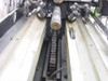 Oxberry 1500 film registration pin mechanism and sprocket chain drive visible in platen channel