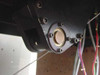 Underside view of Oxberry 1500 camera column mount showing circular brass bearing race and bolt pattern