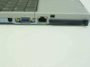 Unbranded N222 S Notebook Laptop right rear side view — VGA port, RJ-45 LAN port, 4-pin FireWire port, and optical drive bay