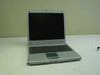Unbranded N222 S Notebook Laptop open front view — silver casing, black keyboard, LCD screen, touchpad, media buttons on front edge with DC power plug beside unit