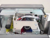 Interior mechanism of Eltron Privilege S.A. card printer with lid open showing print head assembly, ribbon path, rollers, and wiring