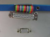 AMC Barkhausen Tester 549637-003 — rear panel detail showing DB25 female and DB9 female connectors with rainbow ribbon cable