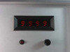 AMC Barkhausen Tester 549637-003 — front panel detail showing 4-digit red LED display reading 9999 with indicator lamp and toggle switch