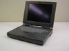 Mitsuba TS30AS vintage laptop – three-quarter front view showing open lid, LCD display, and full keyboard