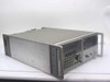 Eaton 380K11 Synthesized Signal Generator — three-quarter front view showing benchtop rackmount chassis, front panel controls, and carry handles