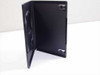 Black single disc case open from rear, showing inside back panel and two cover retention clips