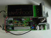 DSC Links 1000 – main circuit board assembly with green PCB, heatsinks, terminal blocks, and Links 1000 label