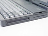 AST PowerExec 3/25SL right side — 3.5-inch floppy drive bay and card slot, AST logo on lid