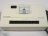 Oxford XM-90 8-channel monitor front panel showing ON and PEAK buttons, Shinohara microammeter gauge, BATT and channel 1-8 selector buttons