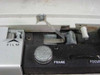 Close-up of projector film gate area showing Film label, Frame control knob, and Focus control label