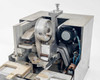 Hollywood Chicago 2816 splicer – internal mechanism close-up showing drive wheel, motor assembly, linkage arms, and blue wiring