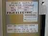 Fuji Electric power supply label showing model B14L-5105-0155A#A2, input 100-120VAC/200-240VAC 7A/4A, outputs +5V 24A +12V 1A -6V 1A -5.2V 5A +24V 4.8A -24V 6A, dated 1989-1