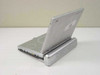 Initial IDM-1731 portable DVD player rear and side view showing battery compartment dock