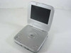 Initial IDM-9530 5-inch TFT portable DVD player open with screen raised and disc tray visible – front three-quarter view