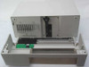 ADIC AutoDAT tape library housing with top cover removed, showing internal chassis with expansion card slots and lower transport rail assembly with PCB
