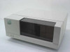 ADIC AutoDAT Tallgrass 4mm DAT tape library autoloader housing — front view showing smoked-tinted access door and brand logo