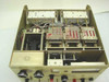 Carnel Labs NM-65T – top-down interior view showing multiple shielded RF filter/mixer modules, wiring harness, and internal subassemblies