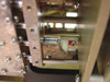 Carnel Labs NM-65T – close-up of internal tuning or switching mechanism showing metallic slider, red marker, and label; foam/rubber seal visible