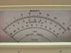 Carnel Labs NM-65T – close-up of front analog panel meter face showing Microvolts scale (1–1000), dB referred to 1uV, -dBm, and Battery Recharge/Operate indicator arc