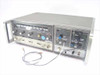 HP 8620C Sweep Oscillator with Hughes plug-ins installed – front panel and right side view showing frequency dial and controls