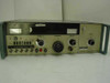 Singer SG-1000 Signal Generator front panel with SG-1001 Frequency Extender attached at right — range and frequency controls, output meters, and toggle switches visible