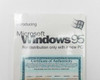 Microsoft Windows 95 OEM booklet upper portion — Introducing Windows 95 title and Windows 95 logo with shrink wrap intact
