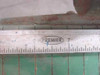 Close-up of Premier brand stamp on the integrated inch ruler of the Photo Materials Co. paper cutter