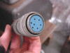 Multi-pin circular connector on Sola 28-5093 DC Power Supply showing blue insert with 7-pin arrangement for remote control