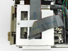 Wang PC240-3 interior close-up — 5.25-inch floppy drive mechanism and ribbon cables from above with top cover removed