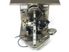 Micro Tooling MT0268 front panel view showing large rotary disc chuck, AMMEX 036 asset tag, Tang and Finger Lock controls, pneumatic actuator assembly, and main power toggle