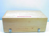 Exterior of wood carrying case with two metal latch closures — houses complete AMG Mono Gold Grammer system