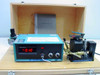 AMG Mono Gold Grammer full system in open wood case — Analogic Measureometer II display, air-actuated precision jig, and pneumatic regulator visible