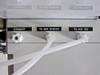 Cabinet exterior bottom panel showing labeled ports: EXHAUST, TO AOV 101&102, and TO AOV 103 with white plastic fittings