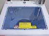 Top view of cabinet showing acrylic window/door panel, CAUTION CHEMICAL warning labels, and BOC Edwards branding strip