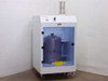 BOC Edwards Systems Chemistry Chemical Daytank Pumping Station Cabinet – front three-quarter view showing acrylic door, stainless daytank inside, and top exhaust stack