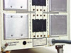 Constant Power 6 rear panel lower section — Circuits 3 through 6; Circuits 3 and 4 have blank cover plates; Circuits 5 and 6 with breakers; Equipment Ground and REPO terminals visible